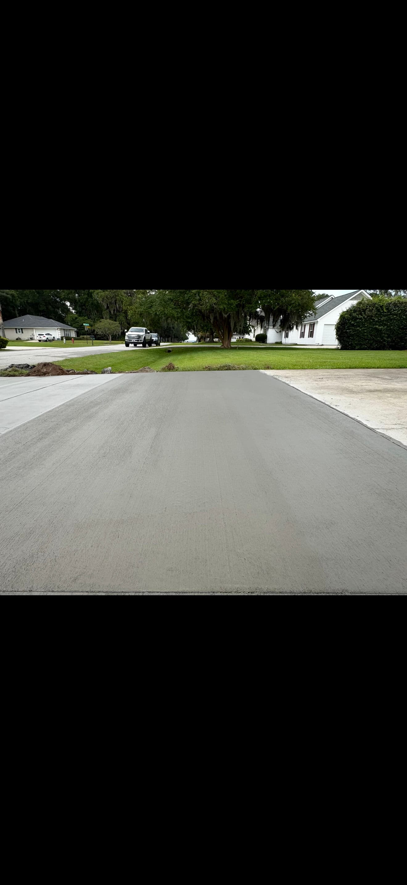 Gallery photos for Erosion Took Out This Driveway - Here's How We Fixed It Right: Image #2
