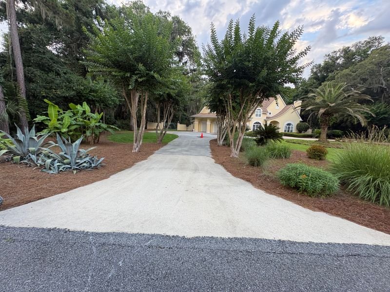 Freshly graded gravel driveway on a completed KWS Excavation project
